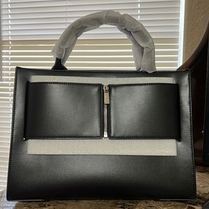 Brandon Blackwood jumbo Kuei in vegan black. Never used, in box with bag.